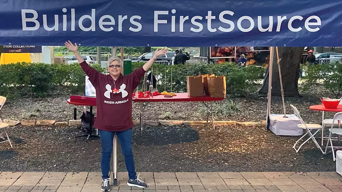 BFS Female Employee with Arms in the Air at LLS Event