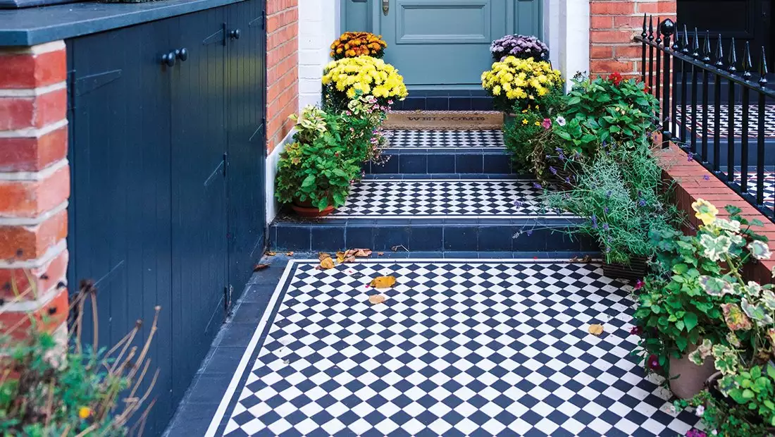 Exterior Checkerboard-Tiled Entrance to House