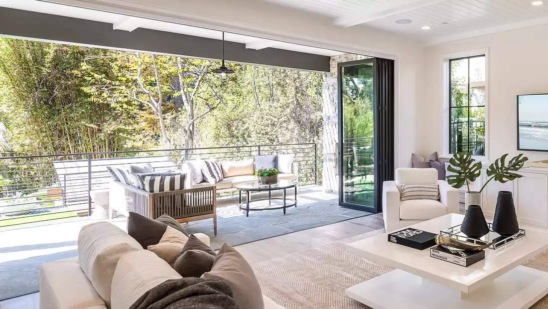 Modern Living Area featuring Large Open Door Concept with Outdoor View and Access